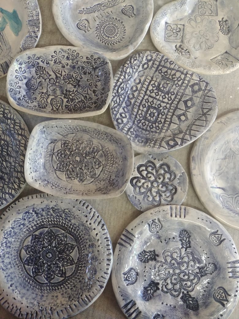Party painted pottery drying