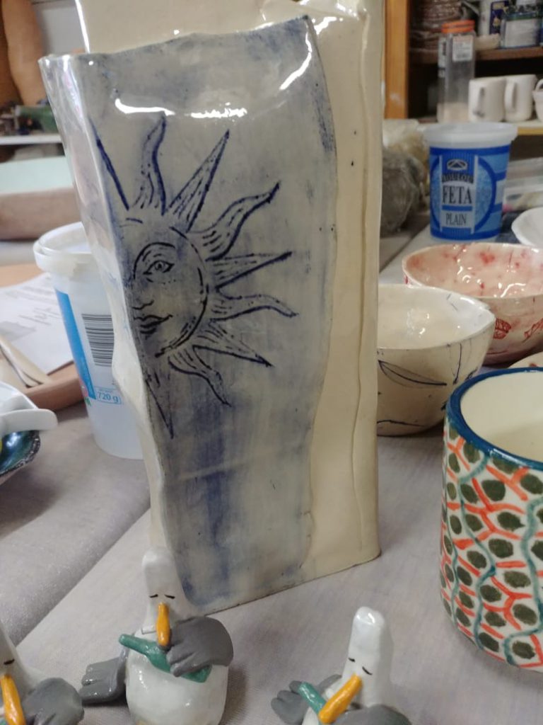 Ceramics, Stoneware, cobalt oxide wash, sun imprint